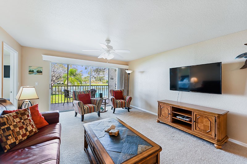 Great Room opens to Screened Lanai with Lake View