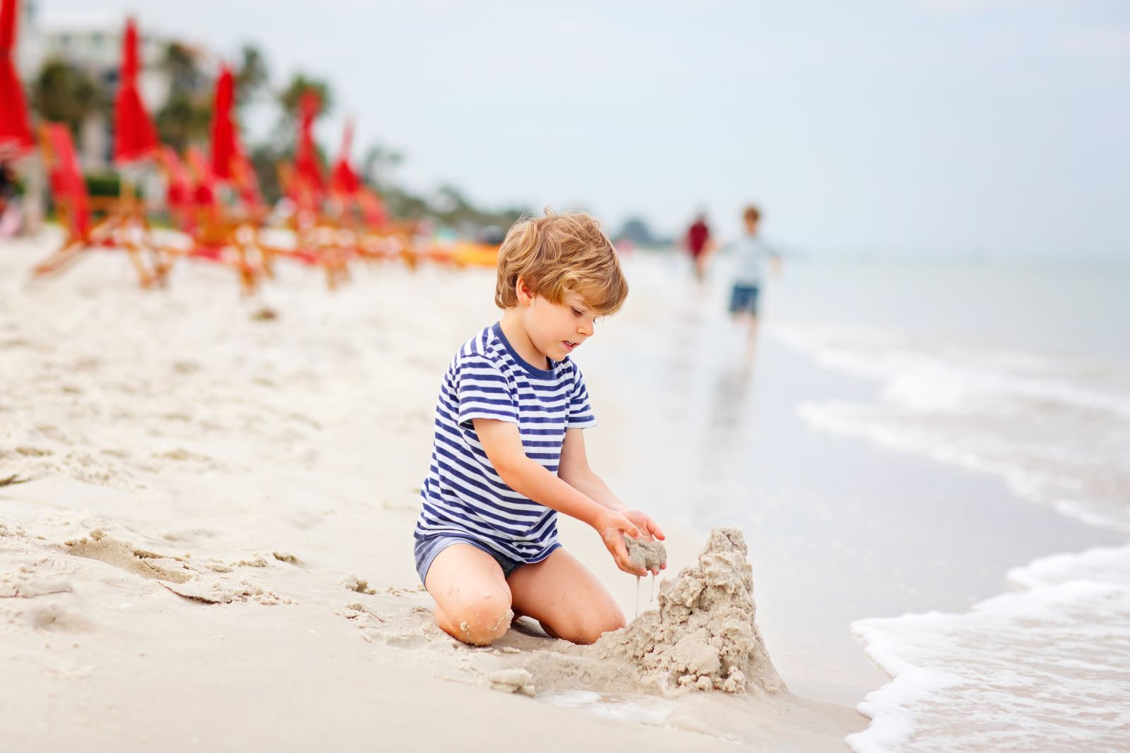 child-building-a-sandcastle
